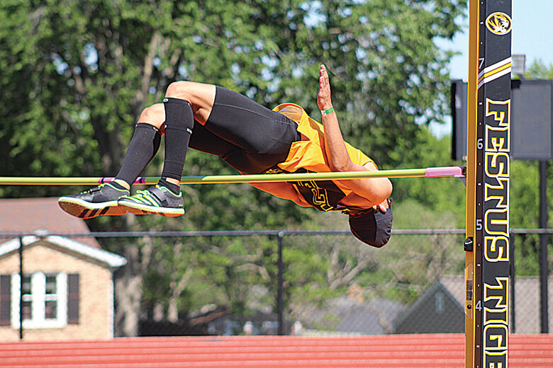 Festus wins boys, girls district meets on home track